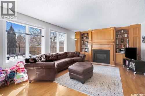 1022 Hurley Way, Saskatoon, SK - Indoor Photo Showing Living Room With Fireplace