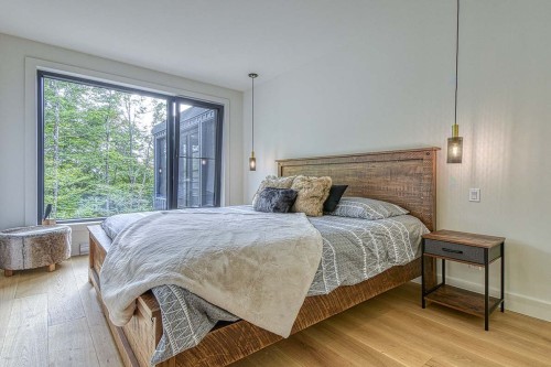 Chambre à coucher principale - 565 Ch. Du Refuge, Lac-Supérieur, QC - Indoor Photo Showing Bedroom