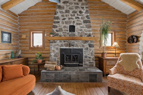 Autre - 225 Ch. Laurent, Saint-Adolphe-D'Howard, QC - Indoor Photo Showing Living Room With Fireplace
