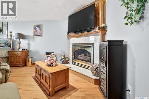 80 Bluebell Crescent, Moose Jaw, SK - Indoor Photo Showing Living Room With Fireplace