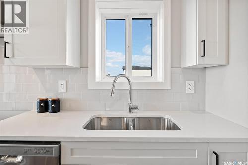10 Vancouver Crescent, Pilot Butte, SK - Indoor Photo Showing Kitchen With Double Sink