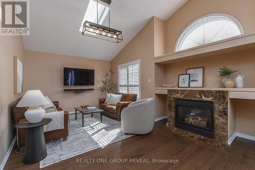37 Wetherburn Drive, Whitby, ON - Indoor Photo Showing Living Room With Fireplace