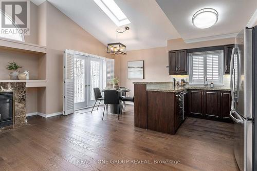 37 Wetherburn Drive, Whitby, ON - Indoor Photo Showing Kitchen With Fireplace