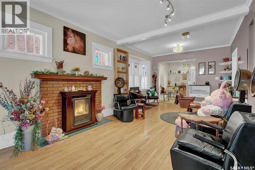 3230 13Th Avenue, Regina, SK - Indoor Photo Showing Living Room With Fireplace