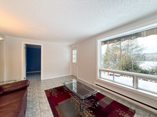 Salle familiale - 21  - 23 Ch. Alban, La Pêche, QC - Indoor Photo Showing Living Room