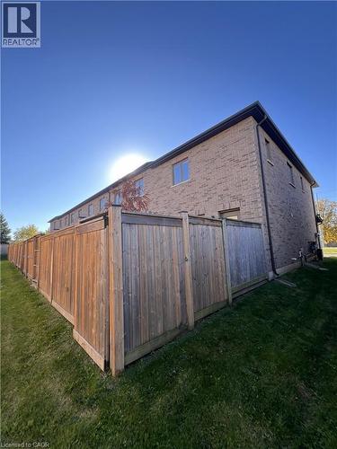 View of home's exterior featuring brick siding - 1165 West 5Th Street, Hamilton, ON - Outdoor