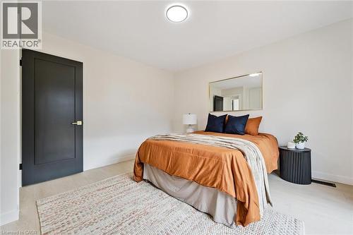 Bedroom featuring baseboards and light wood-style flooring - 459 Drummerhill Crescent, Waterloo, ON - Indoor Photo Showing Bedroom