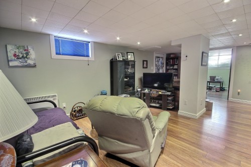 Salle familiale - 154  - 156 Av. Frédéric-Hébert, Rouyn-Noranda, QC - Indoor Photo Showing Basement