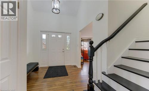 Foyer entrance with hardwood / wood-style flooring and a high ceiling - 306 Roxton Drive, Waterloo, ON - Indoor Photo Showing Other Room