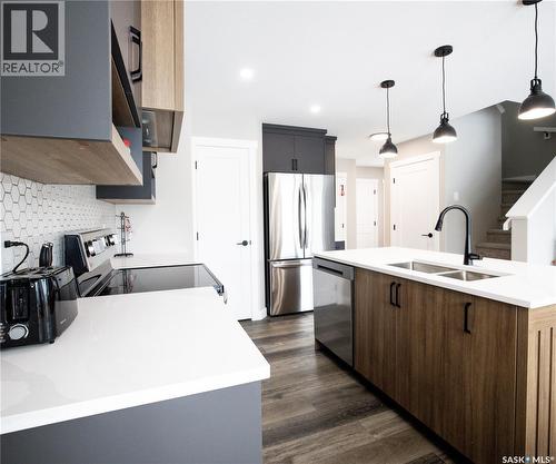 3060 Dumont Way, Regina, SK - Indoor Photo Showing Kitchen With Stainless Steel Kitchen With Double Sink With Upgraded Kitchen