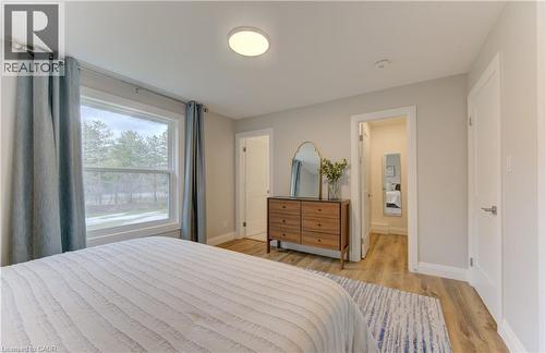 Bedroom featuring light wood-style floors and baseboards - 395 Warrington Drive, Waterloo, ON - Indoor Photo Showing Bedroom