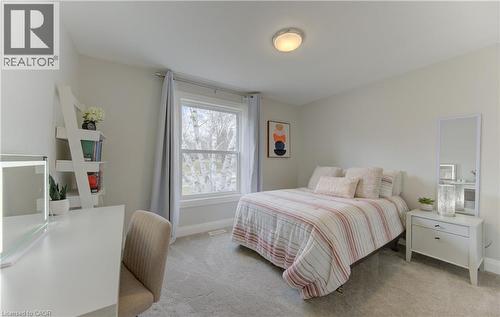 Bedroom featuring light colored carpet and baseboards - 395 Warrington Drive, Waterloo, ON - Indoor Photo Showing Bedroom