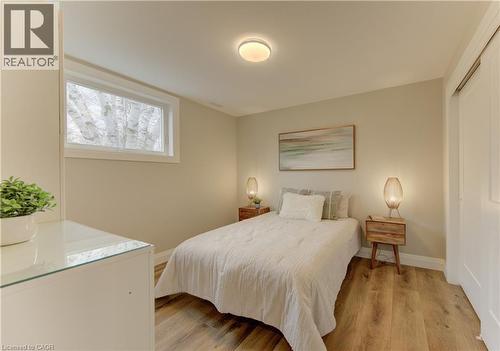 Bedroom with light wood finished floors and a closet - 395 Warrington Drive, Waterloo, ON - Indoor Photo Showing Bedroom