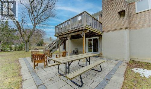 View of patio with outdoor dining space and a wooden deck - 395 Warrington Drive, Waterloo, ON - Outdoor With Deck Patio Veranda