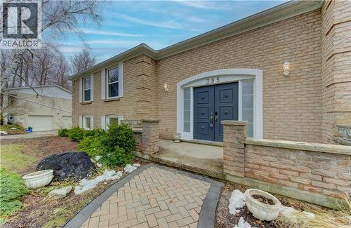Property entrance featuring brick siding - 395 Warrington Drive, Waterloo, ON - Outdoor