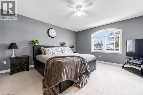Bedroom featuring light carpet and ceiling fan - 160 Wallace Avenue S, Welland, ON - Indoor Photo Showing Bedroom