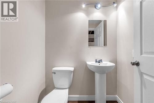 Bathroom featuring toilet and baseboards - 160 Wallace Avenue S, Welland, ON - Indoor Photo Showing Bathroom