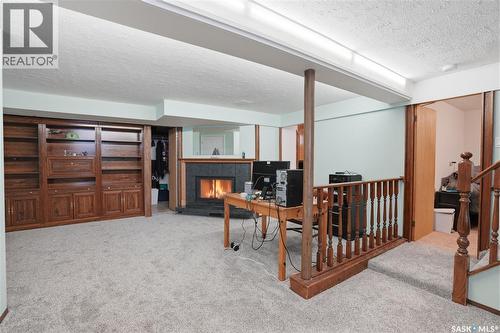 1011 Taylor Street E, Saskatoon, SK - Indoor Photo Showing Other Room With Fireplace