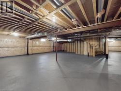 Unfinished basement featuring stairs - 