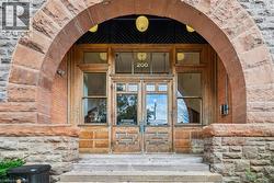 Entrance to property with stone siding - 