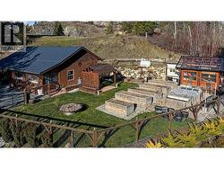 Fenced yard with raised beds Creston - 