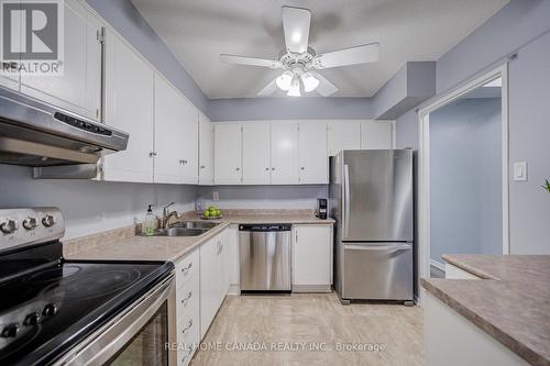 708 - 1359 White Oaks Boulevard, Oakville, ON - Indoor Photo Showing Kitchen With Stainless Steel Kitchen With Double Sink