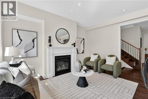 4 Beasley Grove, Ancaster, ON - Indoor Photo Showing Living Room With Fireplace