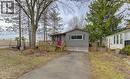 Manufactured / mobile home featuring a deck and asphalt driveway - 580 Beaver Creek Road Unit# 11, Waterloo, ON  - Outdoor 