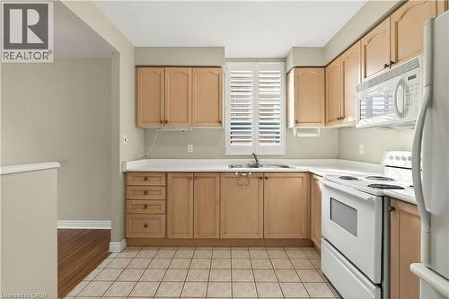 8 Main Street Unit# 101, Dundas, ON - Indoor Photo Showing Kitchen With Double Sink