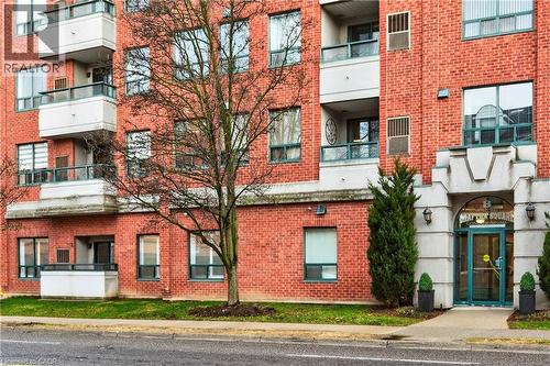 8 Main Street Unit# 101, Dundas, ON - Outdoor With Balcony With Facade