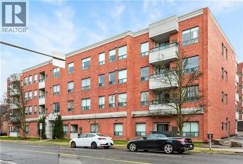 8 Main Street Unit# 101, Dundas, ON - Outdoor With Balcony With Facade