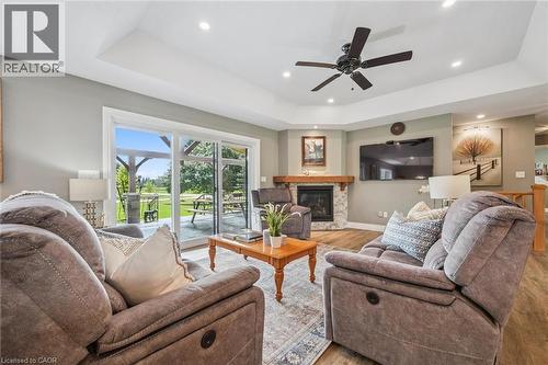 100 Harris Crescent, Mount Forest, ON - Indoor Photo Showing Living Room With Fireplace