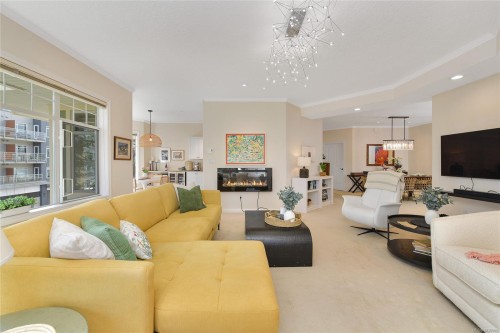 302-9870 Second St, Sidney, BC - Indoor Photo Showing Living Room With Fireplace