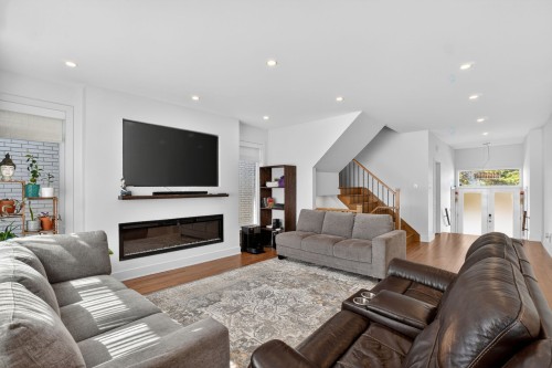 Salon - 415 Rue Vanier, Brossard, QC - Indoor Photo Showing Living Room With Fireplace