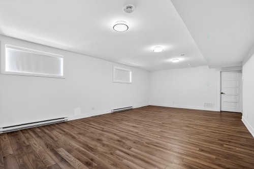 Salle familiale - 415 Rue Vanier, Brossard, QC - Indoor Photo Showing Other Room