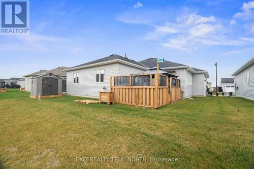 Backyard with shed - 8 Sinclair Crescent, Ramara, ON - Outdoor With Deck Patio Veranda