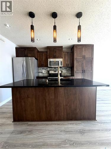 103 Plains Circle, Pilot Butte, SK - Indoor Photo Showing Kitchen