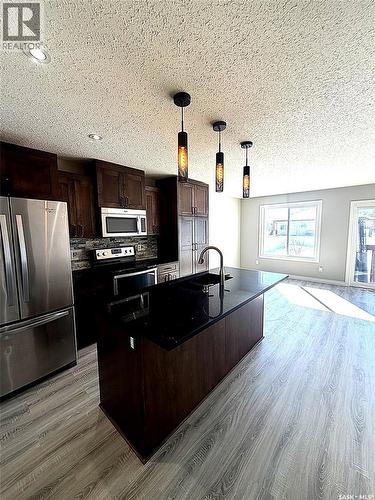 103 Plains Circle, Pilot Butte, SK - Indoor Photo Showing Kitchen