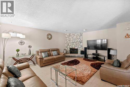 55 Noonan Road, Regina, SK - Indoor Photo Showing Living Room With Fireplace
