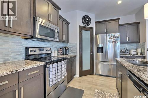 5345 Mckenna Crescent, Regina, SK - Indoor Photo Showing Kitchen With Double Sink With Upgraded Kitchen