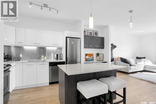 206 404 C Avenue S, Saskatoon, SK - Indoor Photo Showing Kitchen With Stainless Steel Kitchen With Upgraded Kitchen
