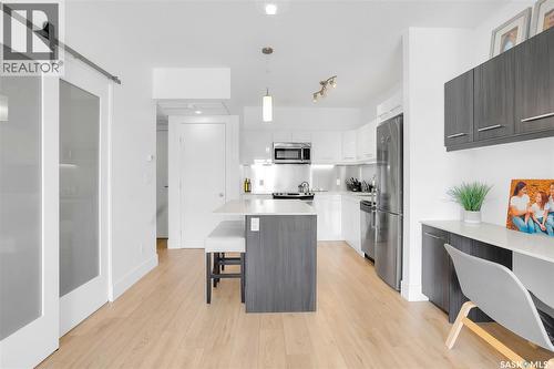 206 404 C Avenue S, Saskatoon, SK - Indoor Photo Showing Kitchen With Stainless Steel Kitchen With Upgraded Kitchen