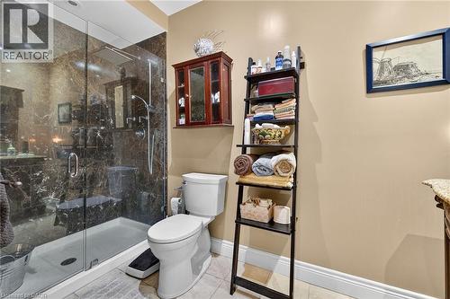 Full bath with vanity, a marble finish shower, and light tile patterned floors - 5590 Blind Line, Burlington, ON - Indoor Photo Showing Bathroom