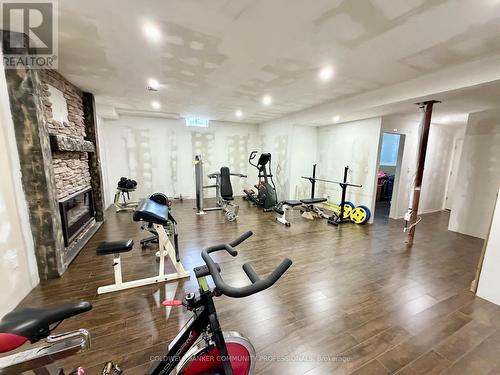 9ft ceilings in basement - 182 Irwin Avenue, Hamilton, ON - Indoor Photo Showing Gym Room