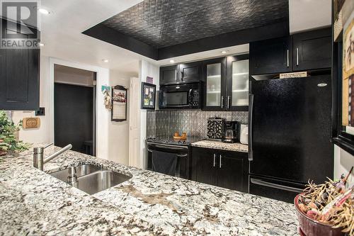Striking Kitchen - 104 - 15 Murray Street, Ottawa, ON - Indoor Photo Showing Kitchen With Double Sink