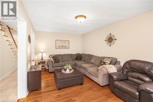 Living area featuring stairway and light wood-style flooring - 40 Artistic Boulevard, Hamilton, ON - Indoor Photo Showing Living Room