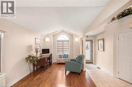 Dining area featuring suspended lighting and wood finished floors - 40 Artistic Boulevard, Hamilton, ON - Indoor