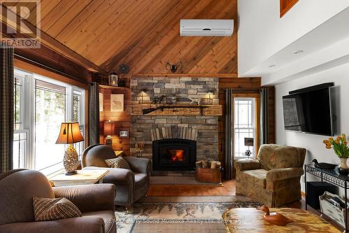 6 West Point Drive, Mckellar, ON - Indoor Photo Showing Living Room With Fireplace