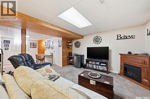 313 7Th Avenue W, Watrous, SK - Indoor Photo Showing Other Room With Fireplace
