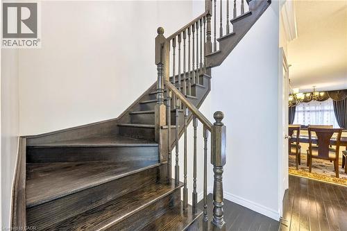 Staircase with hardwood - 182 Irwin Avenue, Hamilton, ON - Indoor Photo Showing Other Room